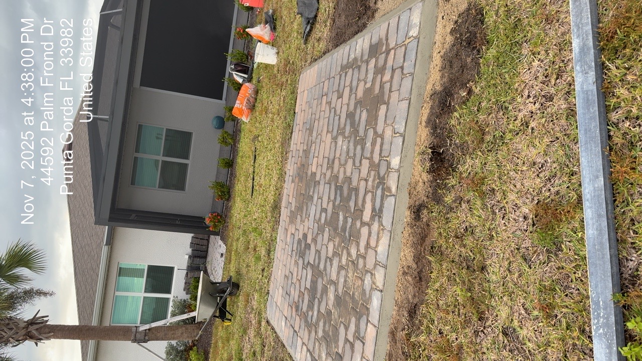 Custom paver pad installation in Punta Gorda backyard